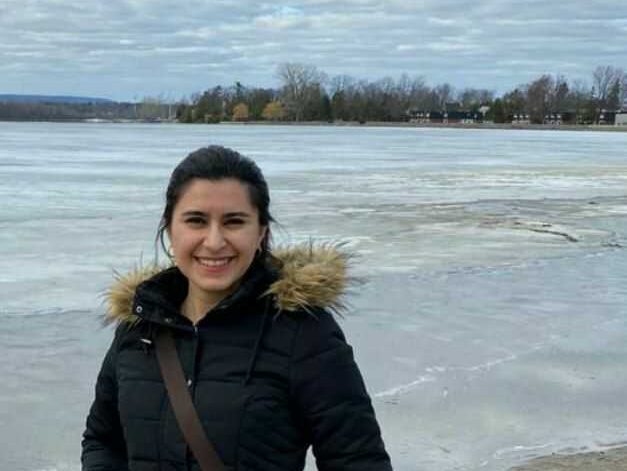 Scholarly Communications Lab research associate Sanam Ebrahimzadeh strikes a pose at the beach