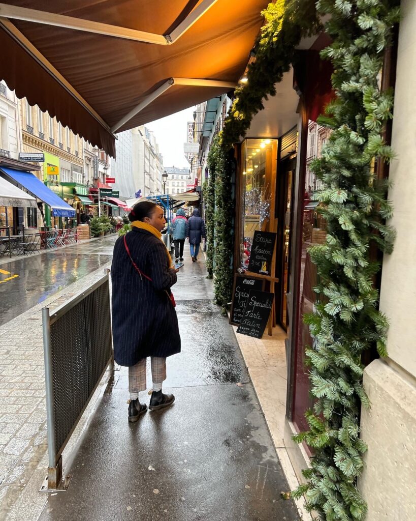 Fatou Bah strolling the streets of Paris while on vacation
