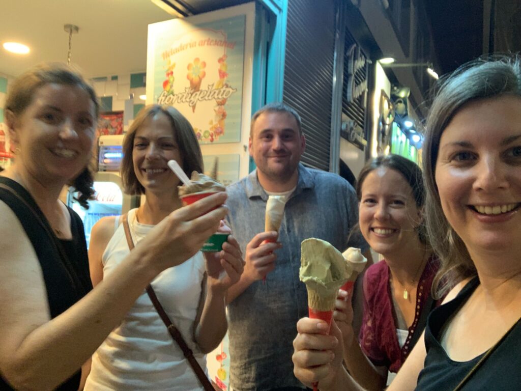 Members and colleagues of the Scholarly Communications Lab, ice cream in hand, smile into the camera