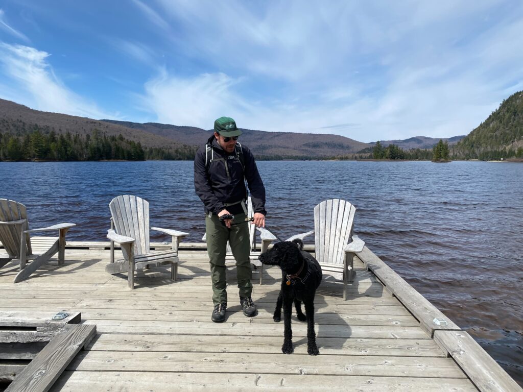 Marc-André and his dog Romeo soaking in the views at Mont-Tremblant in Québec, Canada