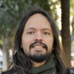 Diego Chavarro, Research Associate at the ScholCommLab, smiles at the camera. 